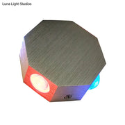 Modern nickel finish octagonal wall sconce with built-in led light and red and blue led accents in brushed metal