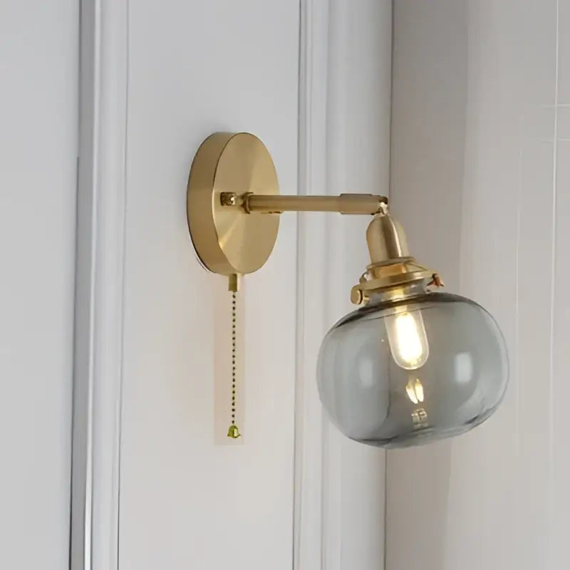 Modern nordic brass glass ball wall lamp with ribbed smoked glass globe and exposed filament bulb for decorbites glass ball wall decor