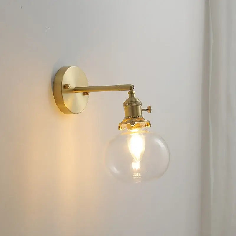 Modern nordic brass glass ball wall lamp with clear globe and exposed filament bulb perfect for bedroom decorbites glass ball