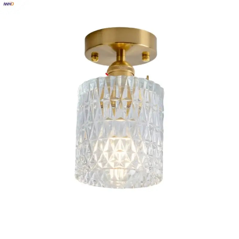 Modern nordic clear glass ceiling light fixture with faceted glass and gold-toned metal mount for bedroom use