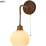 Modern nordic copper adjustable led wall light with warm-toned ribbed glass globe and brass arm for bedroom decorbites copper adjustable