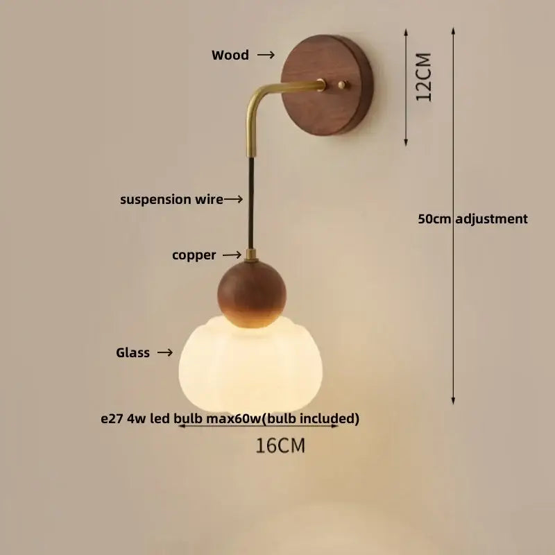 Modern nordic copper adjustable led wall light with wooden backplate brass arm and frosted glass globe decorbites wall light