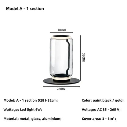 Modern nordic floor lamp with sleek cylindrical glass shade led body and black metal base with gold accents