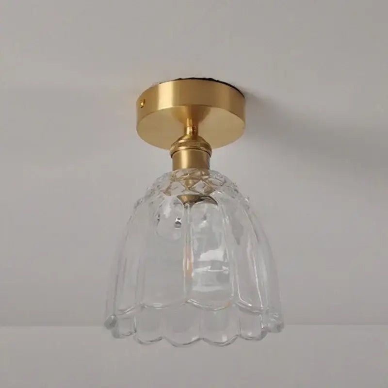 Modern nordic gold glass flower led ceiling lights featuring clear glass bell-shaped lampshade with gold base