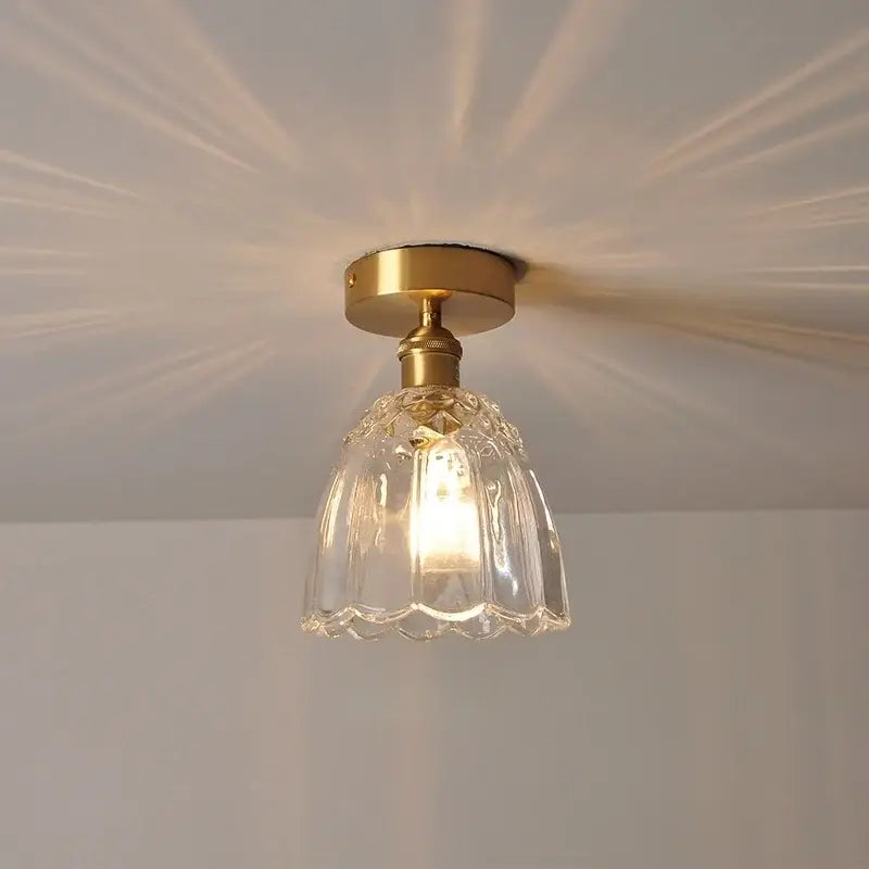 Modern nordic glass flower led ceiling light with clear fluted glass and brass finish for bedroom use