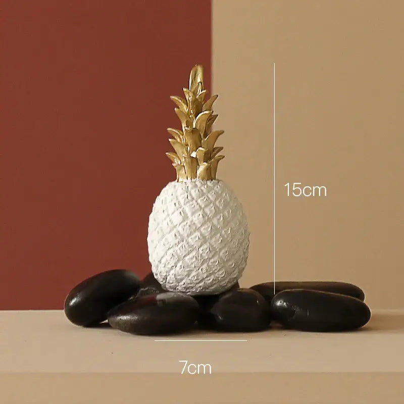Modern nordic golden pineapple figurine in white textured resin with golden leafy top for living room decorbites decorbites golden pineapple