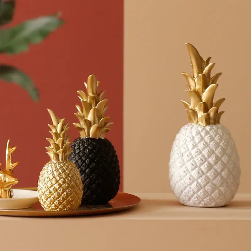 Modern nordic golden pineapple figurine with textured diamond pattern and metallic gold crown for living room decorbites golden pineapple