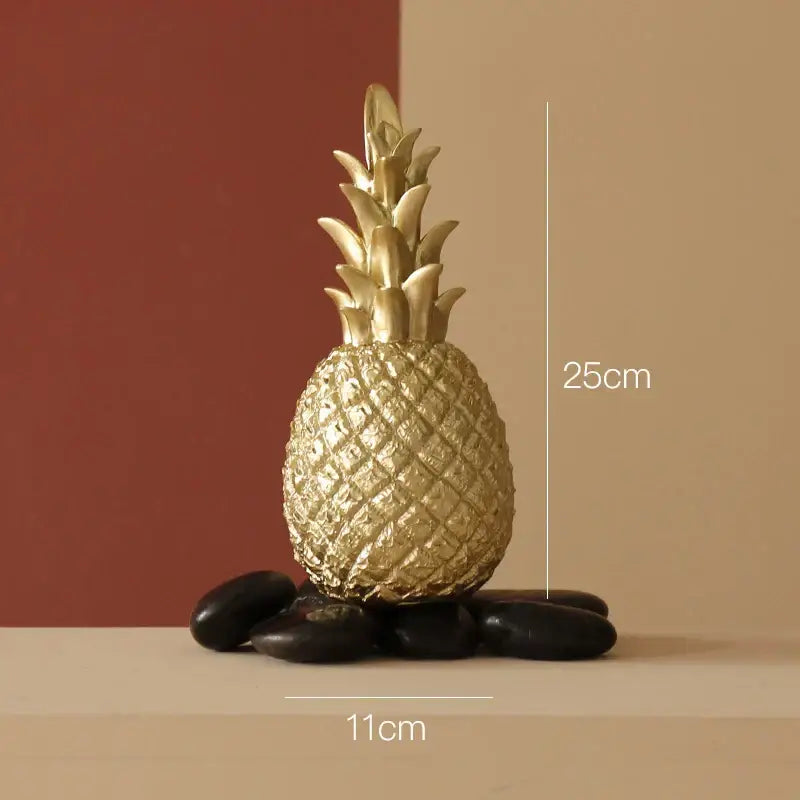 Modern nordic golden pineapple figurine with textured metallic finish and leafy crown for living room decorbites golden pineapple