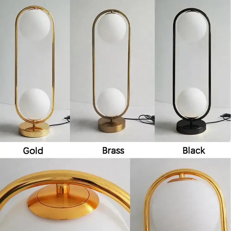 Modern nordic golden body glass led desk lamp with sleek curved metallic frame and frosted white spherical shades decorbites golden body