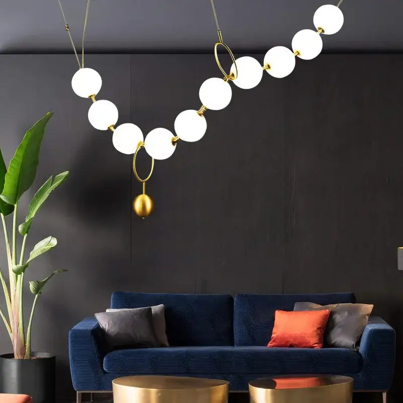 Modern nordic led pendant lamp with white spherical glass bulbs and gold rings for dining room decorbites nordic led chandelier
