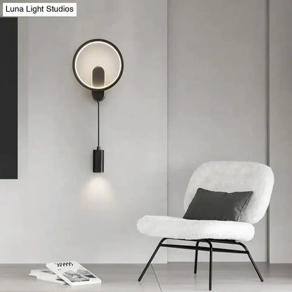 Modern nordic led wall lamp with black gold circular metal frame and adjustable downward-facing cylindrical light fixture