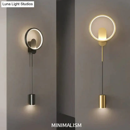 Modern nordic led black gold wall lamp with sleek metallic ring and cylindrical pendant in brushed steel or gold finish