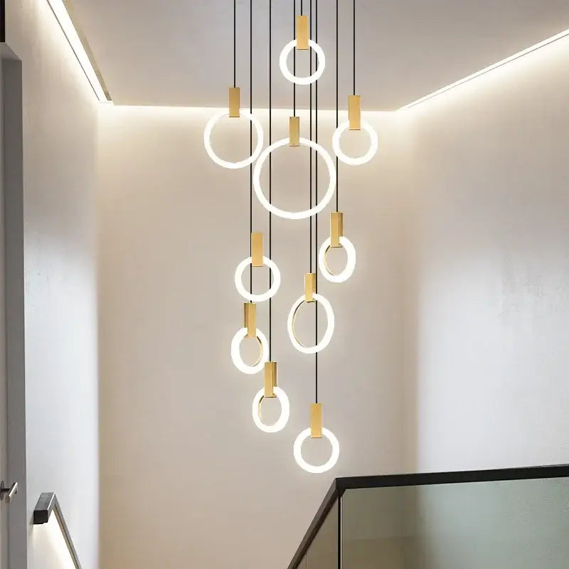 Modern nordic led wood stair chandelier with glowing circular rings and gold connectors by decorbites led wood decor