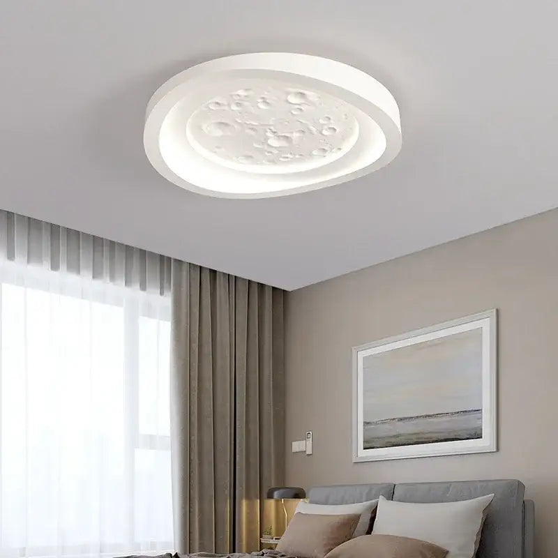 Modern nordic moon surface white led ceiling lamp with textured bubble pattern and soft glowing illumination for bedroom use