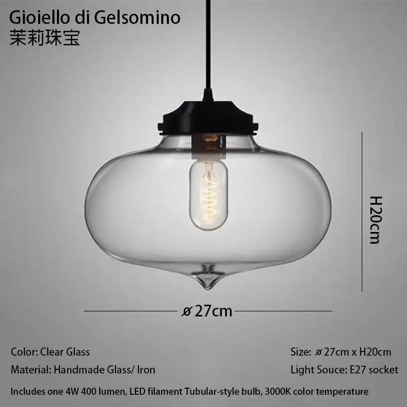 Clear glass pendant light with black iron fixture and led filament bulb in modern nordic polished chrome design