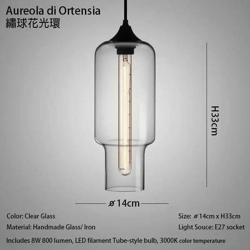 Modern nordic polished chrome pendant light with clear glass and black iron top featuring an exposed led filament bulb