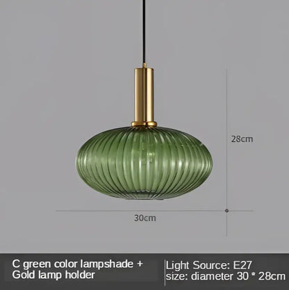 Modern nordic pendant lights featuring a green ribbed glass led glass led pendant with a gold metal holder for dining room