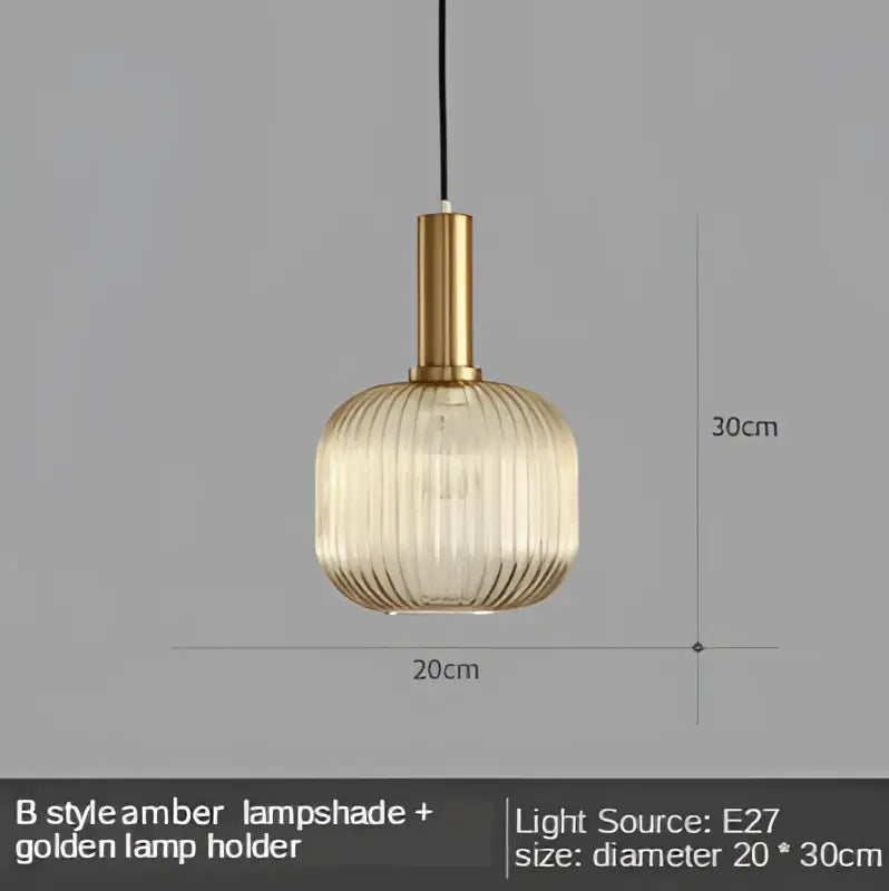 Modern nordic amber glass led pendant light with golden metal holder and vertical ridges for dining room lighting