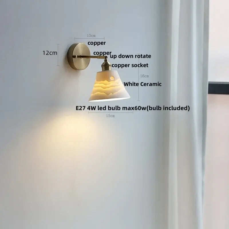 Modern Nordic copper-finished wall lights with white ceramic shade featuring subtle wave texture for bedroom decorbites ceramic wall use