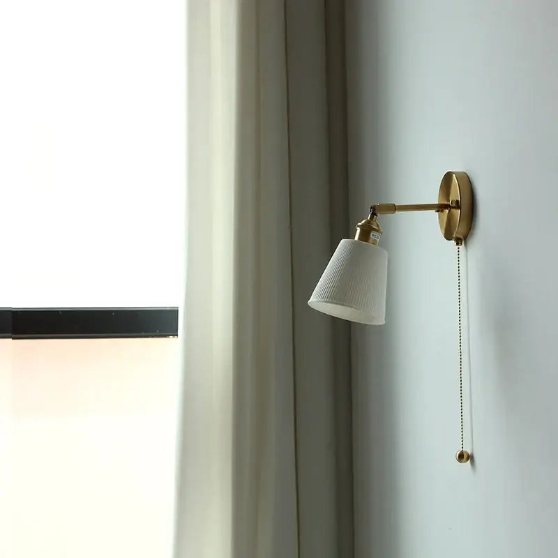 Modern nordic brass wall light with white ribbed ceramic shade and pull chain for bedroom decorbites ceramic wall lights