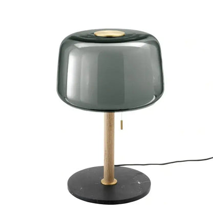 Modern nordic floor lamp with dark gray glass shade, brass accents, light wood stem, and black marble base for living room