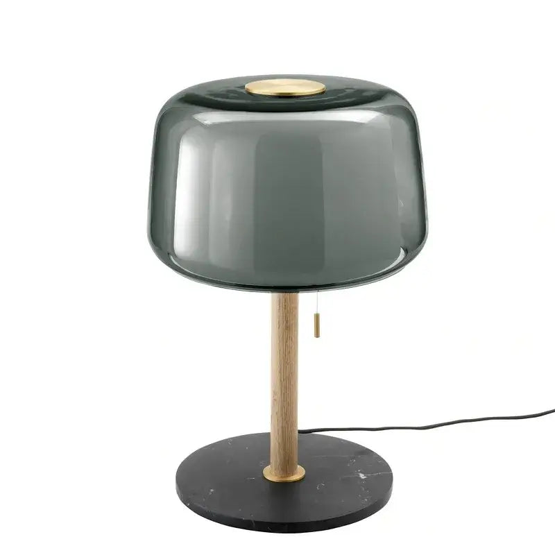 Modern nordic floor lamp with dark gray glass shade, brass accents, light wood stem, and black marble base for living room