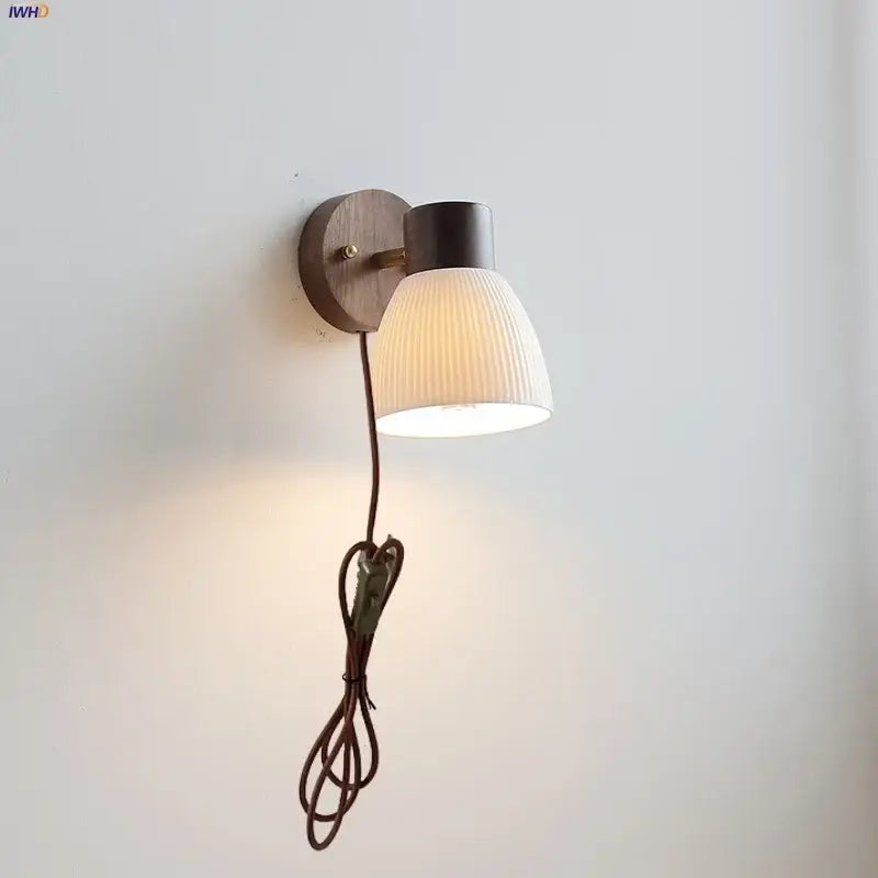 Modern nordic wood and ribbed glass led wall light fixture with warm wooden base and dark metal housing for bedroom decorbites led wall