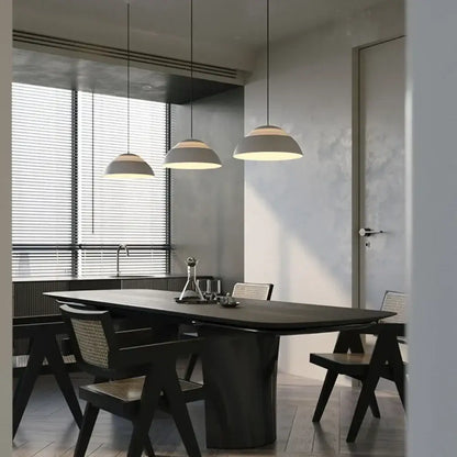 Three modern off white pendant lights with matte glass ball shades hang from ceiling for dining room decorbites glass ball pendant