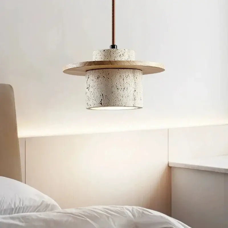 Modern off white stone and wood pendant light with textured concrete body and warm wooden disc for dining room led bulb use