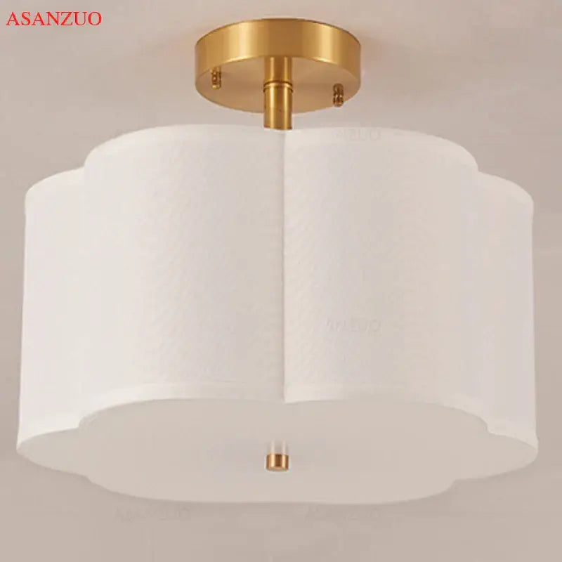 Modern off white textured fabric ceiling light with copper acrylic base by decorbites for bedroom decor