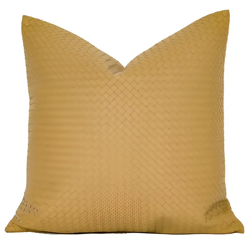 A mustard-yellow throw pillow with textured woven fabric complements decorbites geometric faux leather pillow cover