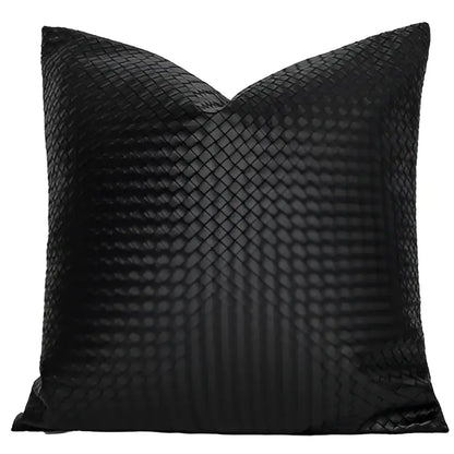 Black woven-textured pillow cover with subtle sheen complementing decorbites geometric faux leather living room decor