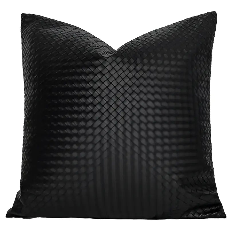 Black woven-textured pillow cover with subtle sheen complementing decorbites geometric faux leather living room decor