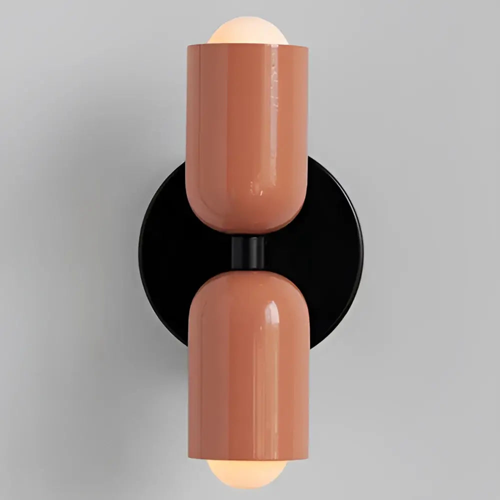 Terracotta cream double head wall lamp with cylindrical design and black base for modern bedroom decorbites cream double