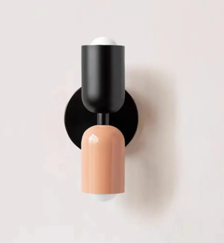 Modern black and peach wall lamps with sleek cylindrical design for decorbites cream double head bedroom use