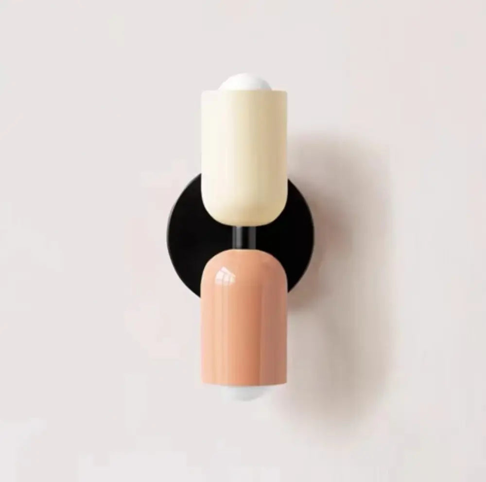 Modern cream double head ceramic wall lamps with peach accents and black base for bedroom decorbites cream double design