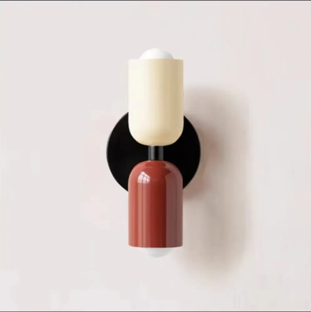Modern olive green and terracotta cream double head wall lamps featuring cream and terracotta cylindrical sconces with black base