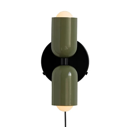 Modern olive green cylindrical wall lamps with black circular backplate and cream double head illuminated bulbs for bedroom decorbites cream double