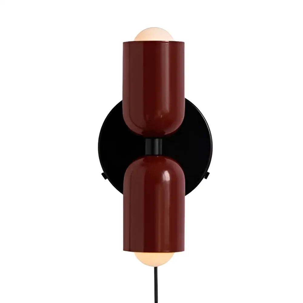 Modern olive green and terracotta cream double head wall lamps with burgundy cylindrical shades and black circular backplate