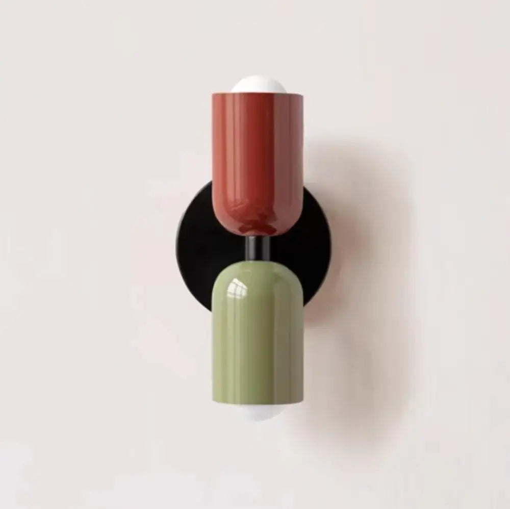 Modern olive green and terracotta cream double head wall lamps with glossy two-toned finish on black circular base