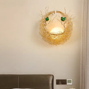 Modern opal glass sconce light with warm-toned bird nest design and green birds for living room wall decoration