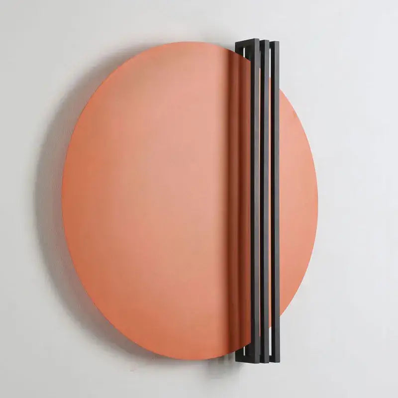 Modern orange and black circular wall lamp with sleek matte coral finish and minimalist black vertical bar for bedroom decorbites circular wall lamp