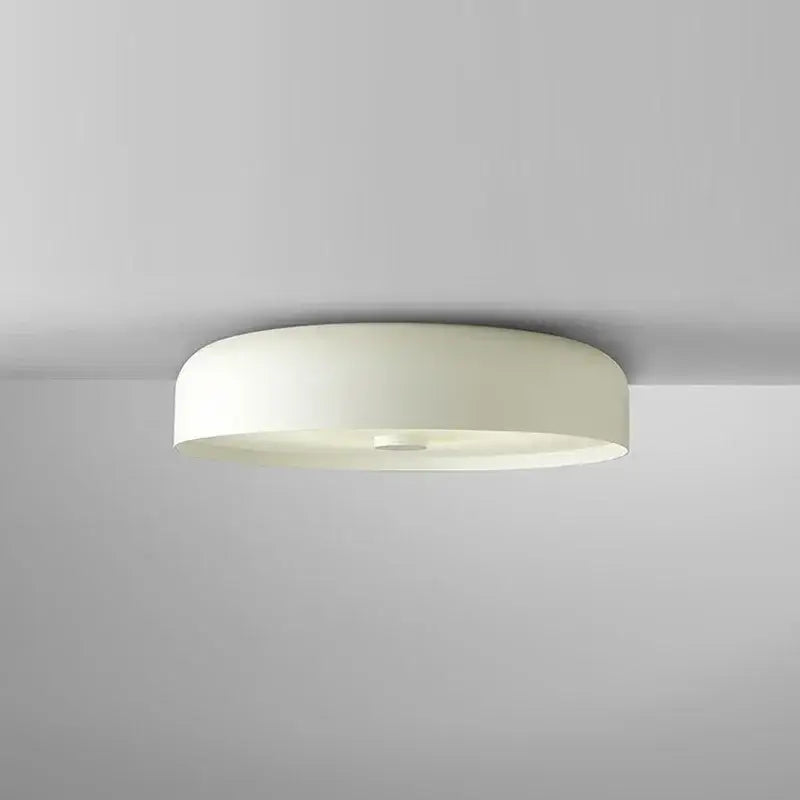 Cream-colored decorbites bowl ceiling lamp with sleek circular design and smooth matte finish for living room decor