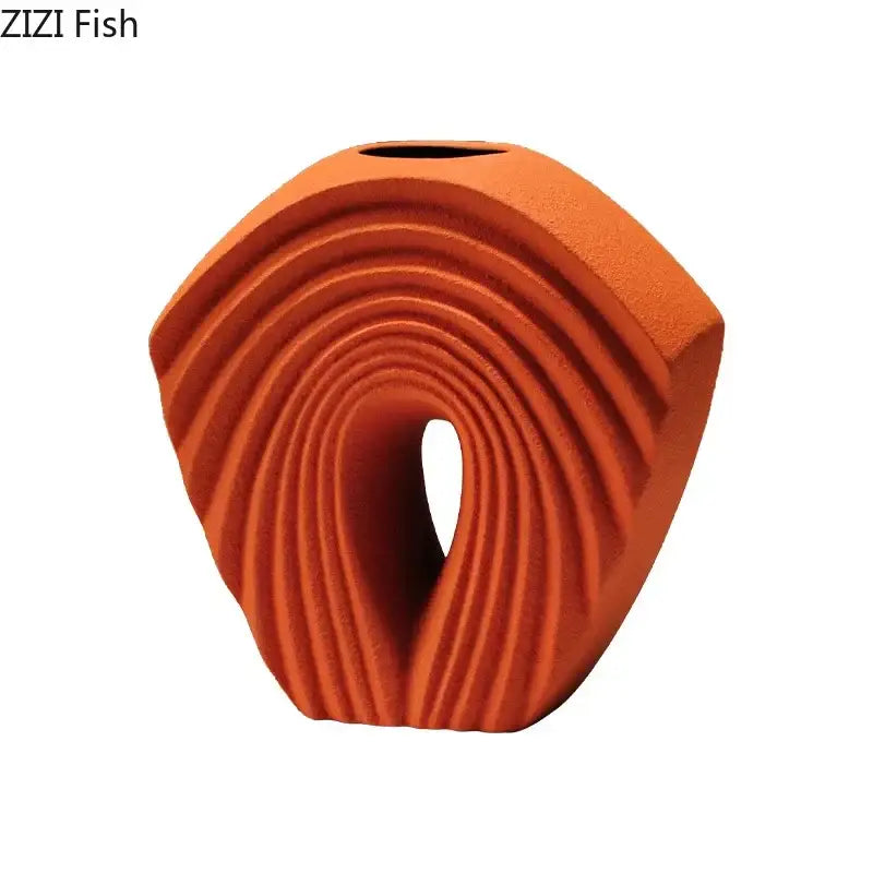 Modern orange geometric ceramic vase with concentric ridged design and central opening for living room decorbites decor
