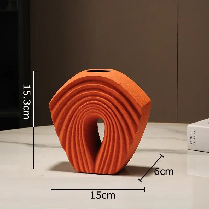 Modern orange geometric ceramic vase with concentric sculpted ridges central opening for living room decorbites decor