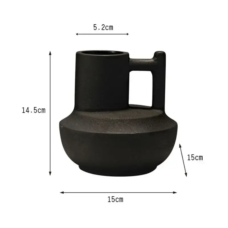 Modern orange geometric ceramic vase with a black matte ceramic vase handle and rounded base for decorbites decor