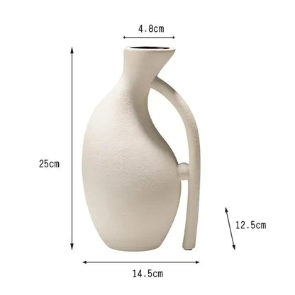 Cream-colored geometric ceramic vase with sleek modern design and integrated handle for living room decorbites decor
