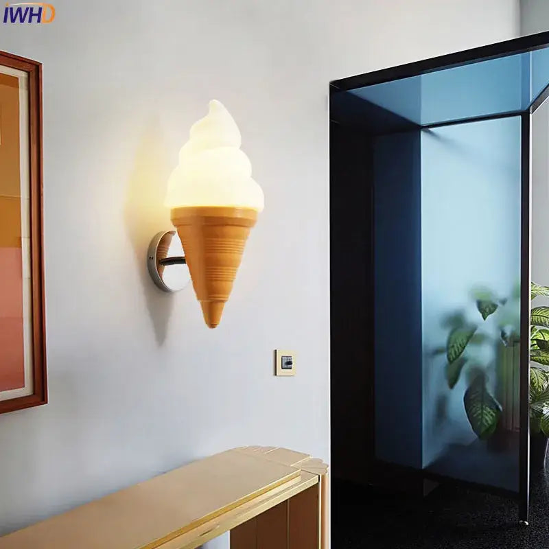 Cream-colored cone-shaped ice cream led wall sconce with glossy finish and ridges for kids bedroom decorbites ice cream
