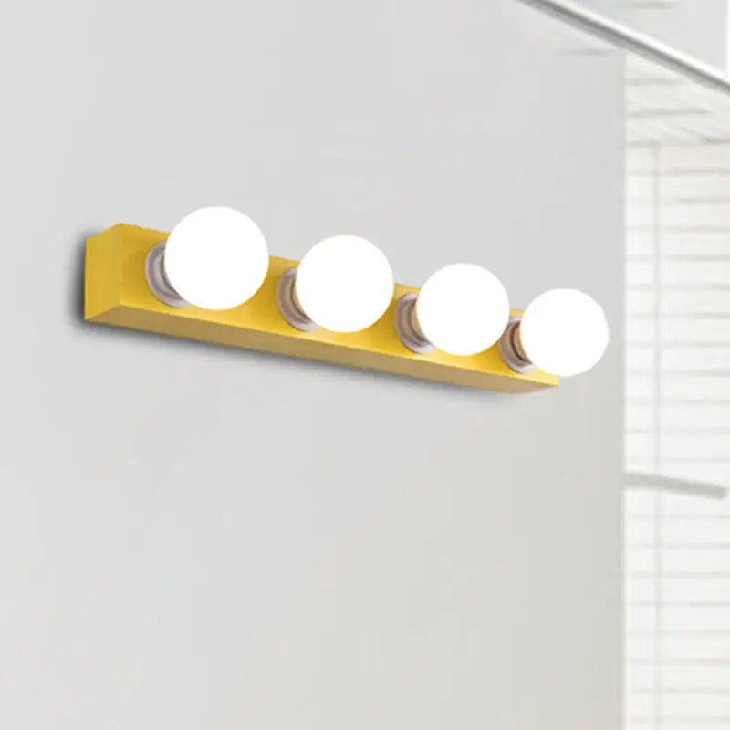 Bright yellow rectangular wall-mounted vanity light fixture with four white round bulbs for bedroom use