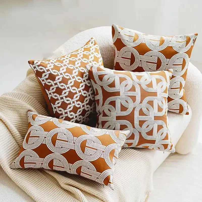 Set of four modern orange and white jacquard crochet pillow covers with geometric patterns for living room decorbites decor